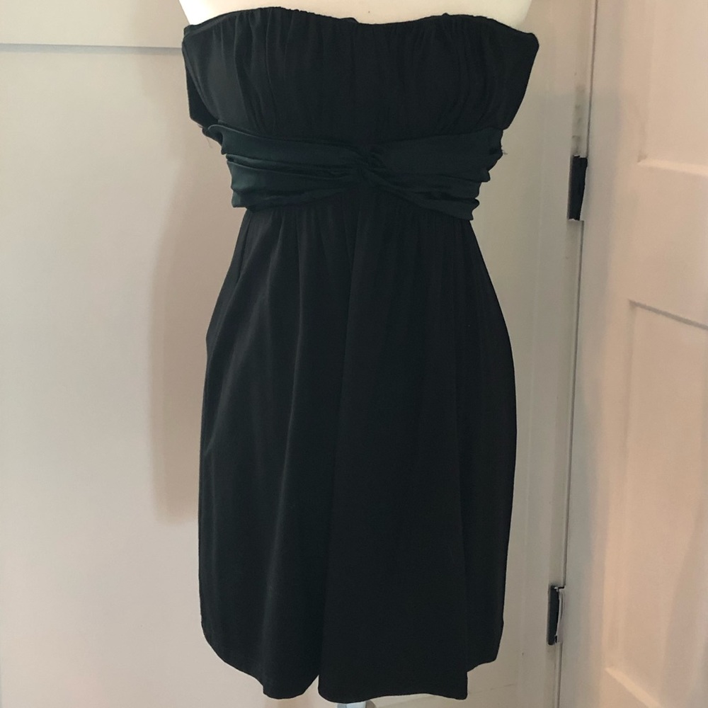 Hot strapless Bebe black mini dress.